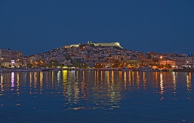 A panoramic view of Kavala at night from the sea